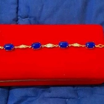 gelang wanita batu biru cat eyes ster di tengah gold plated acessories